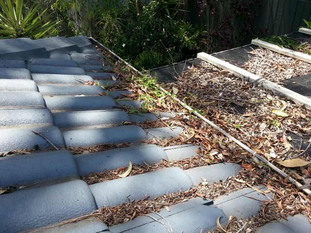 Blocked up tile gutters