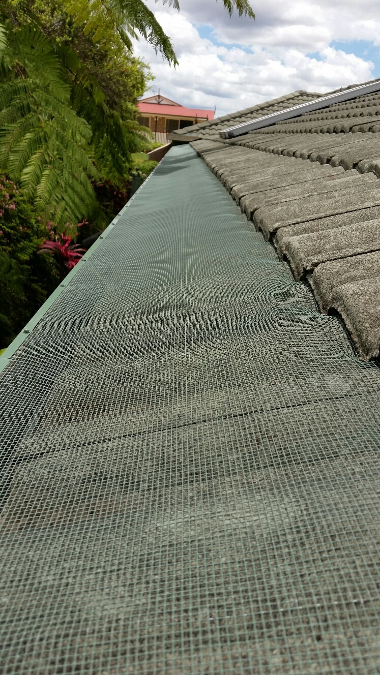 Steel gutter guard on Tile