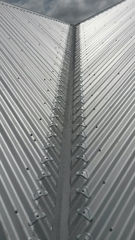 Valley gutter guard on corrugated roof