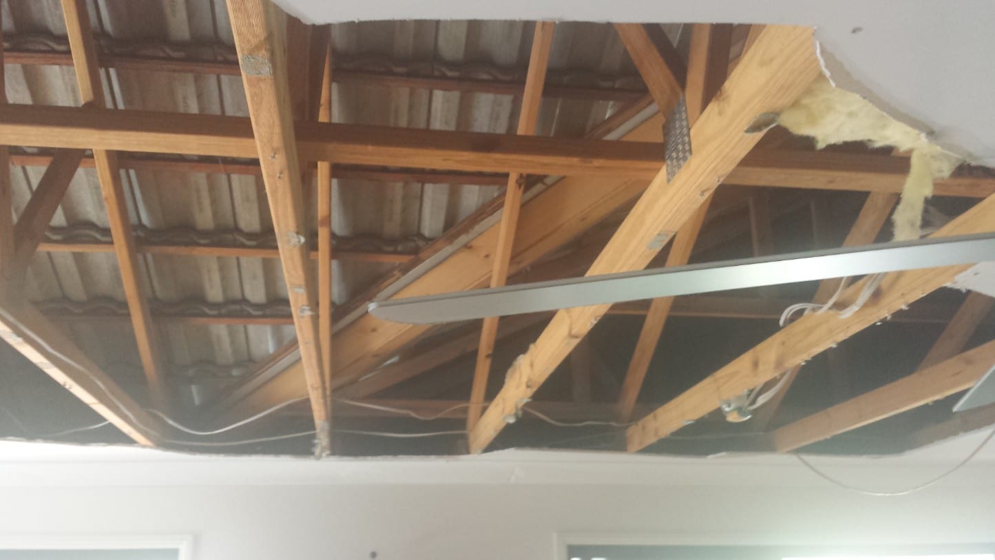 damage caused by a blocked up valley resulted in the ceiling having to be replaced