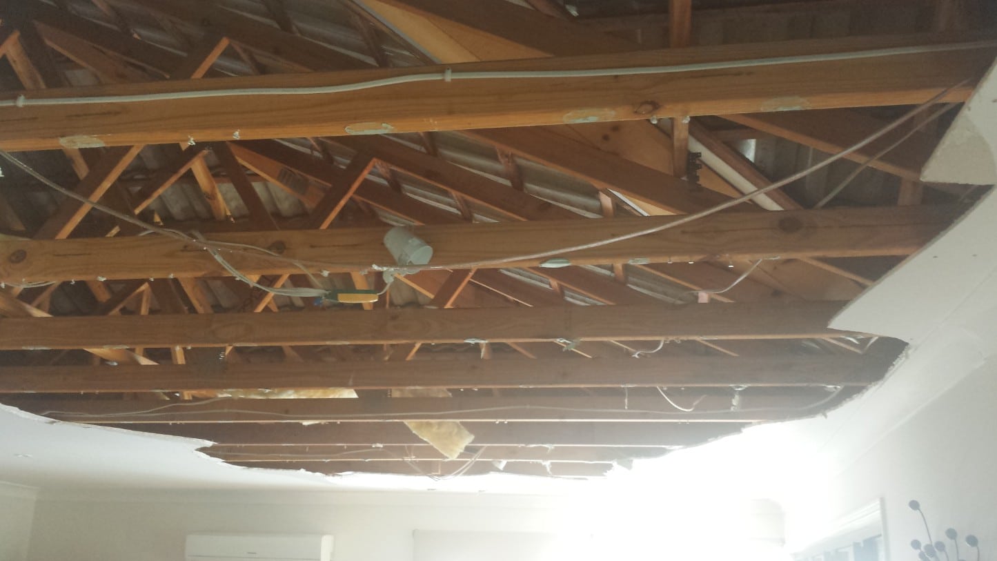 thousands of dollars of damage caused by blocked up gutters not covered by insurance